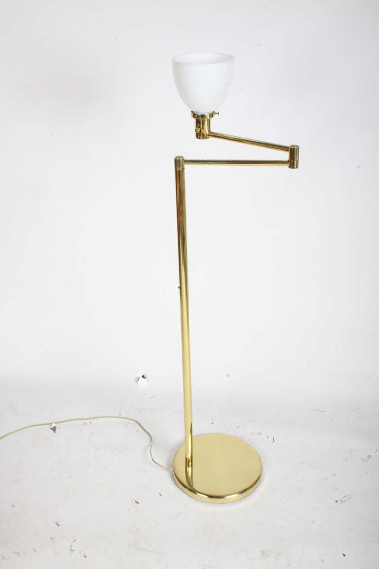 Swing arm Nessen floor lamp in brushed metal finish, also available in brass or chrome finish. Pairs available in chrome and brass. Singles available in chrome and brushed. Shades made very, ask for availability.