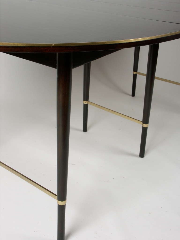 Mid-20th Century Paul Mccobb Oval Mahogany and Brass Dining Table with Six Leaves