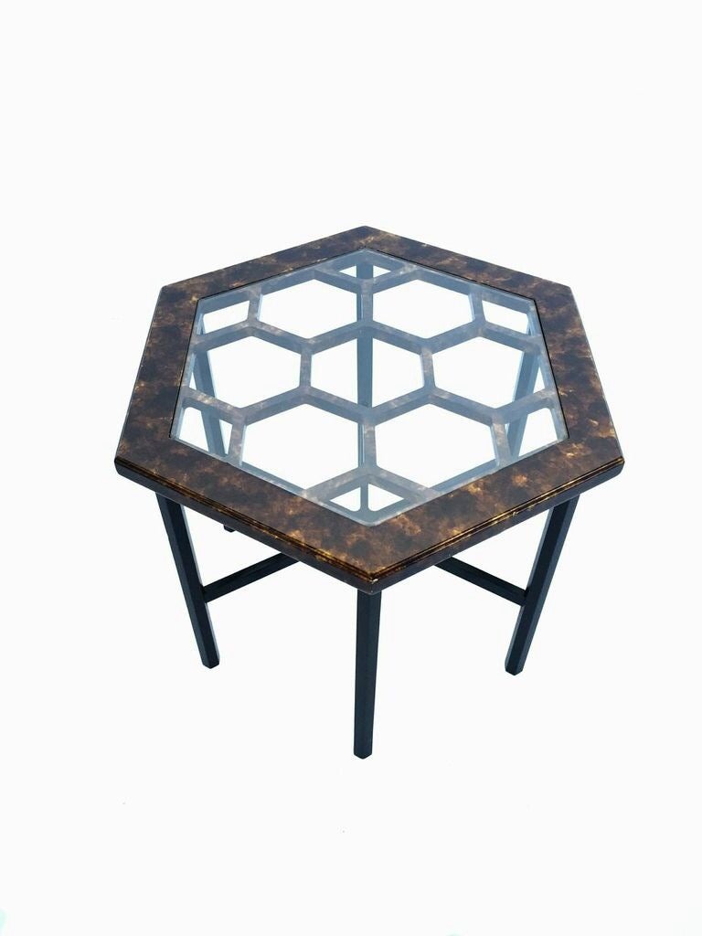 Mid-century table by John Widdicomb, tortoiseshell lacquer top with open grid design with a glass top and ebonized legs. Email for dimensions. 