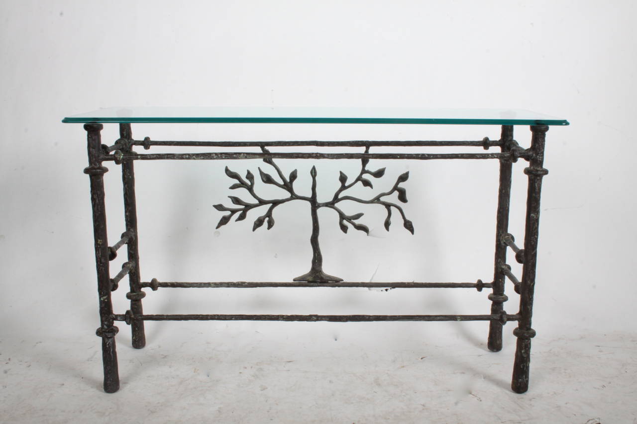 Cast aluminum  sculptural table  with bronze patina finish & glass top. In the style of Giacometti