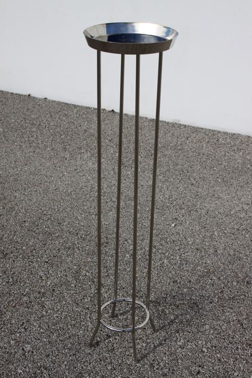 Nickel-plated brass plant stand by Paul McCobb, pictured in 