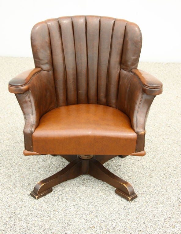 Pair of oversized Vintage Leather  swivel reception chairs