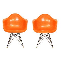 Pair of Orange vintage Eames Eiffel Tower chairs