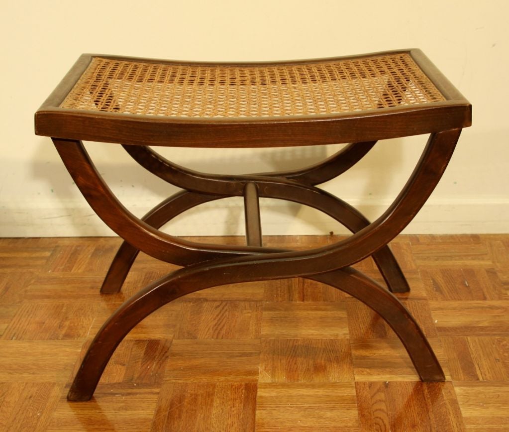 Mahogany frame bench with brass stretcher and cane seat by Edward Wormley for Dunbar