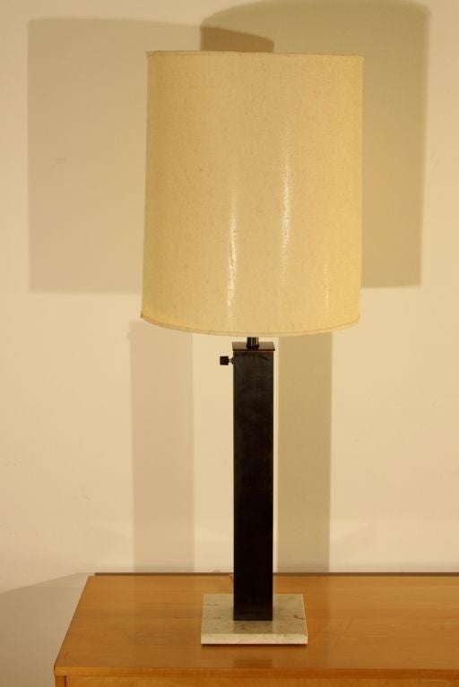 Matching pair of Nessen lamps, oiled bronze metal with marble bases, glass reflectors, fabric shades not included.