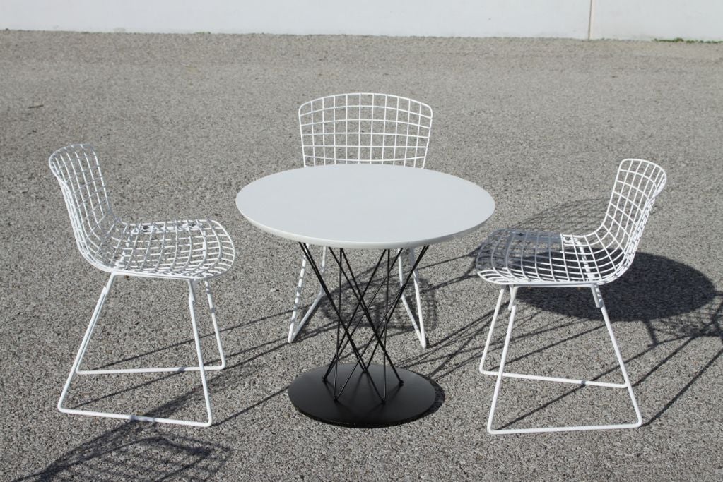 Noguchi child's table with 4 Bertoia children's chairs 4