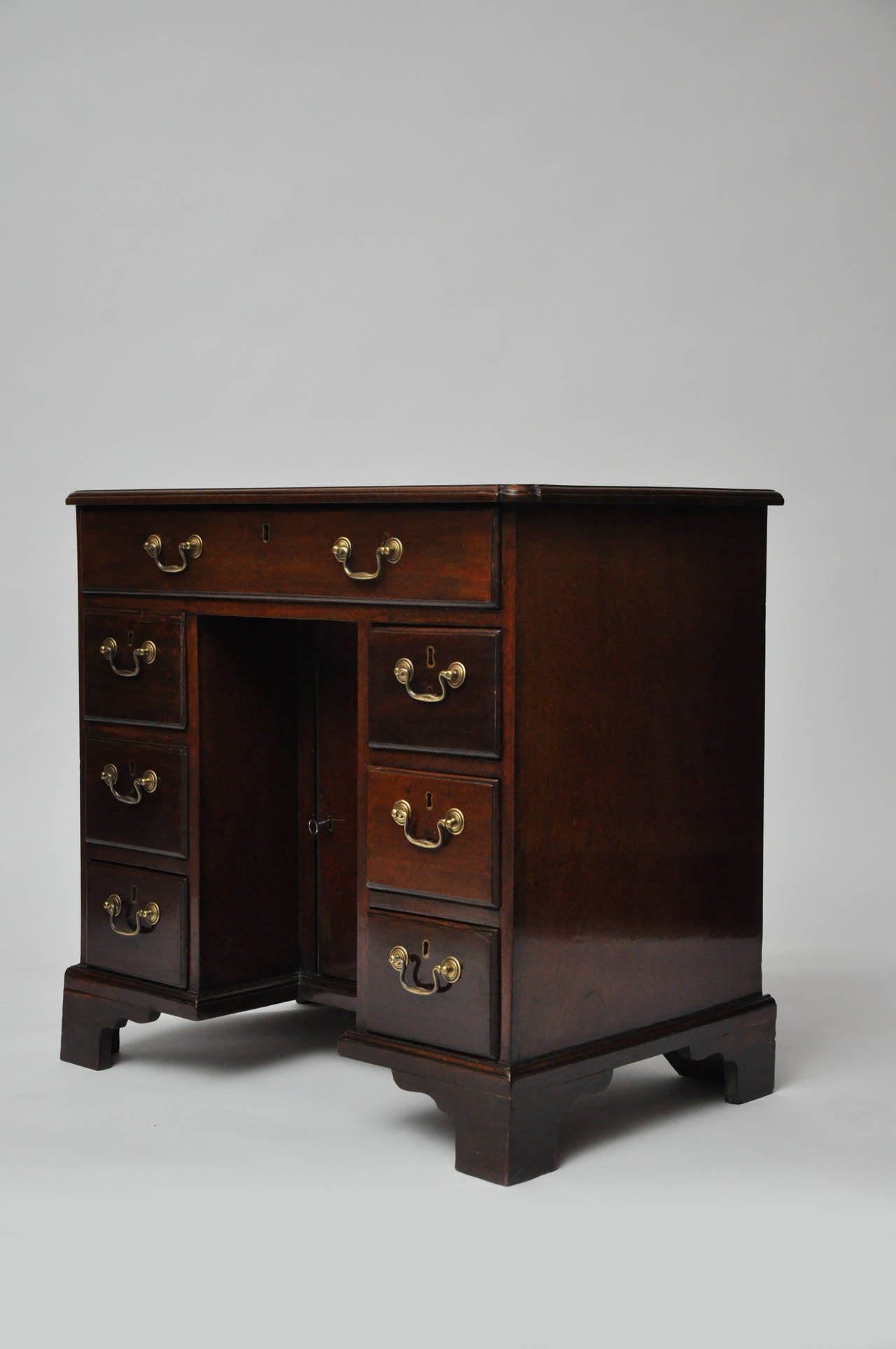 George III Mahogany Kneehole Desk, late 18th Century with seven drawers.