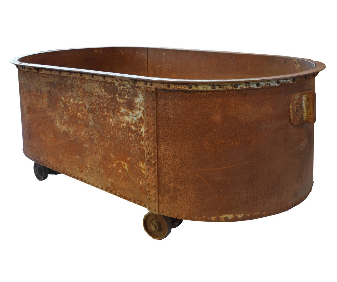 An American cast iron Industrial riveted tub on wheels.