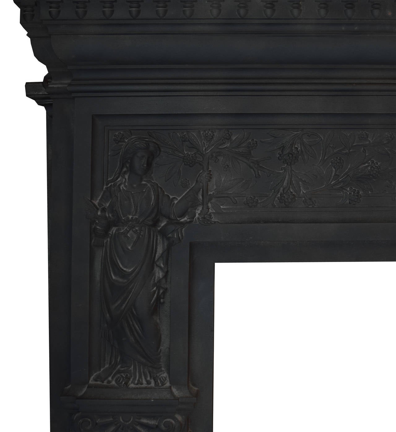 An English polished cast iron fireplace mantel with a peace and plenty motif.
Firebox opening: 35.5
