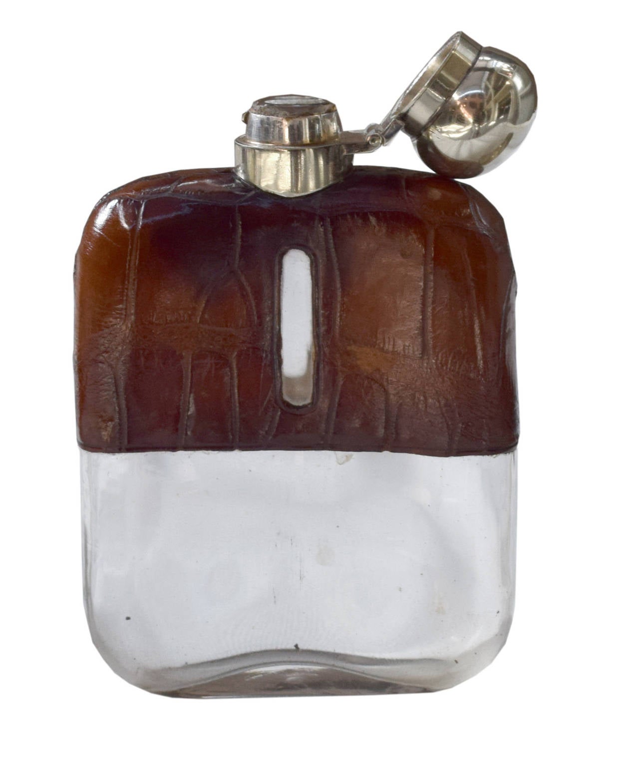Set of Three Vintage Silver and Stamped Leather Hip Flasks For Sale at