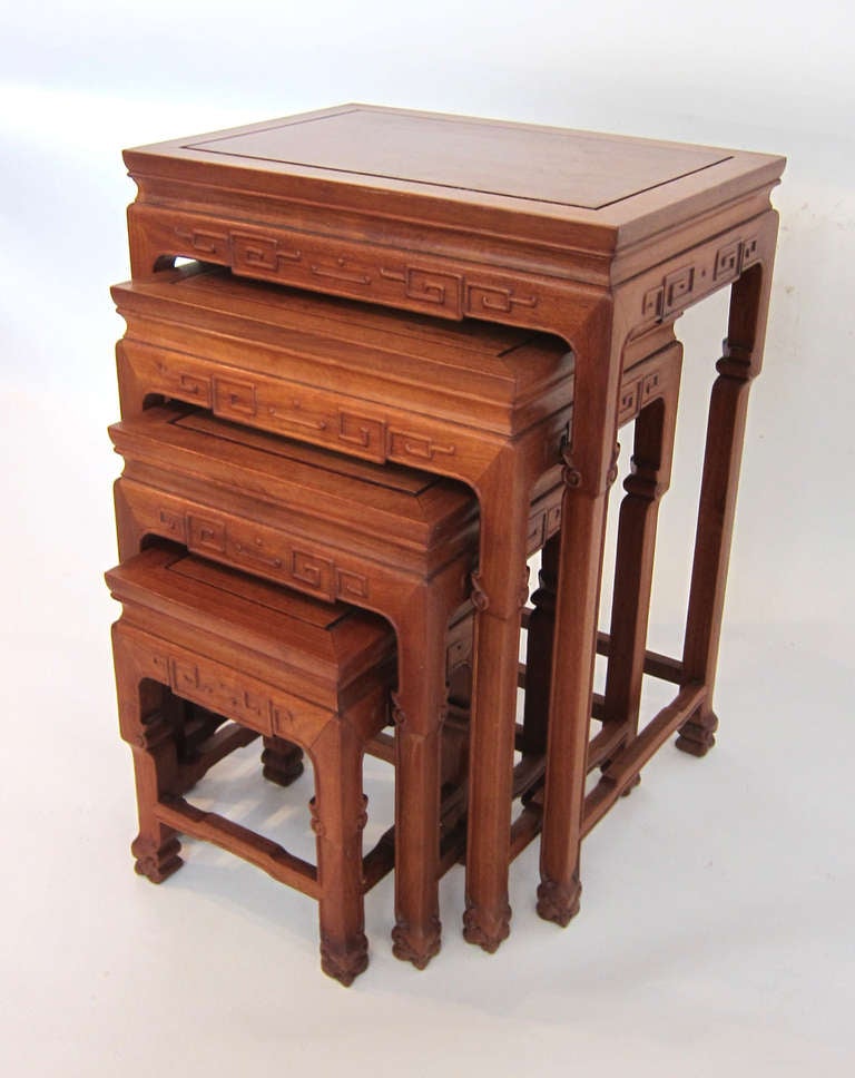 Set of Four (4) Chinese Rosewood Stacking Tables hand made and hand carved having acarved design 