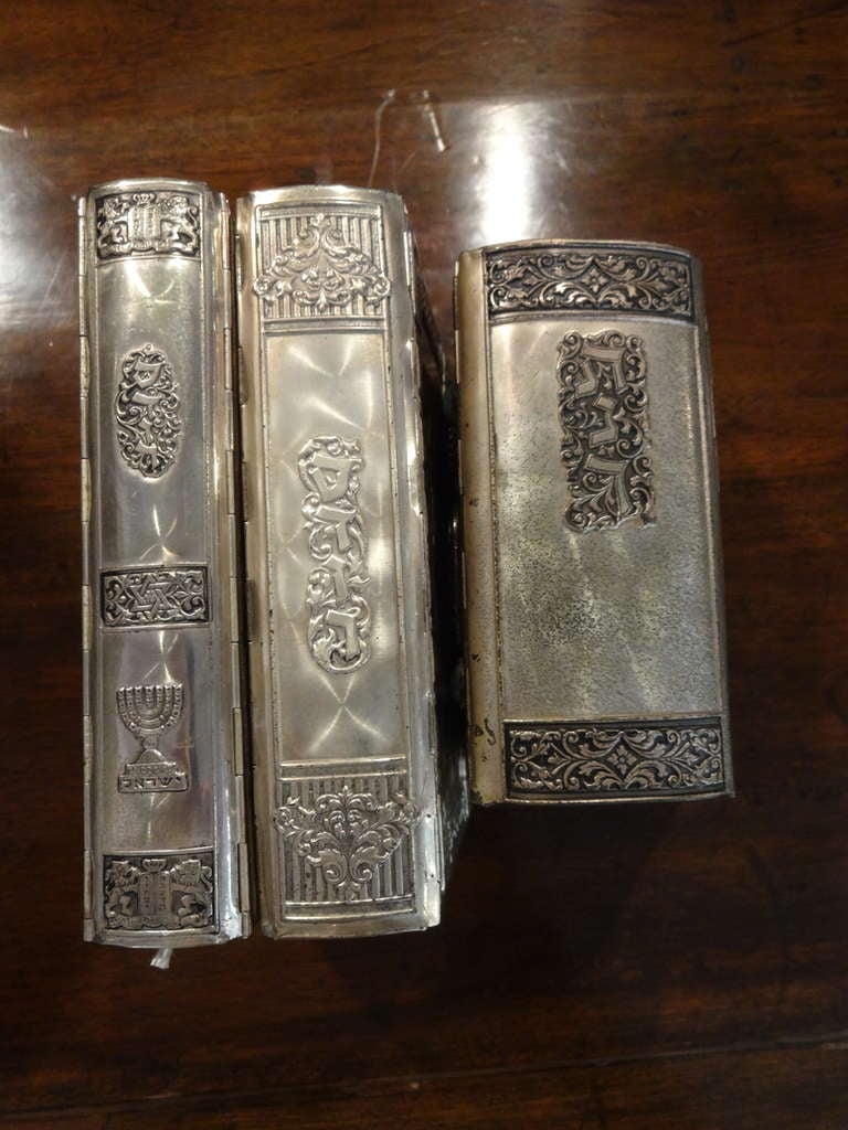 These three (3) BOOKS, 2 Prayer, 1 Old Testament  have silver blended covers made in Isreal. The covers are emblished with semi-presious stones Family information ….. 