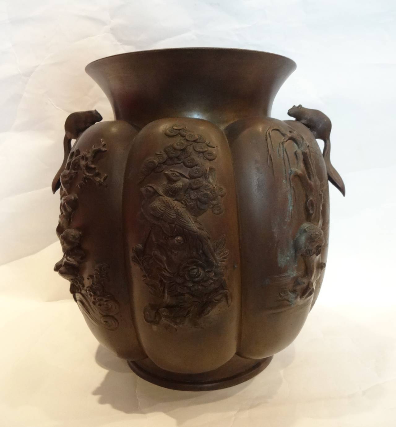 A Japanese bronze pot with squirrel handles