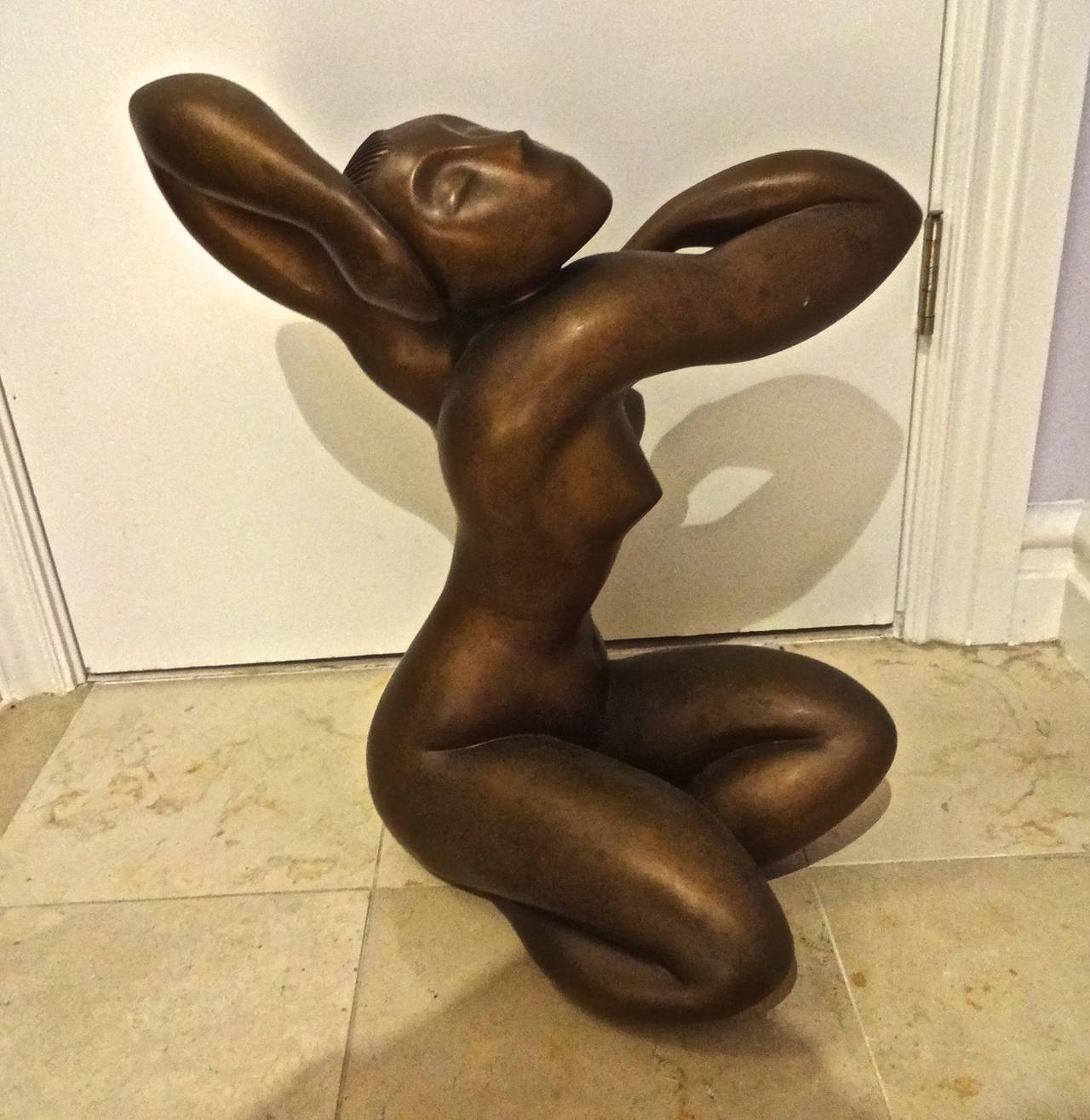 A bronze nude female sculpture, gallery size 