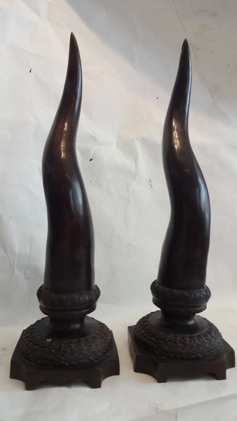 American Pair of Bronze Tusks Statues on Stands