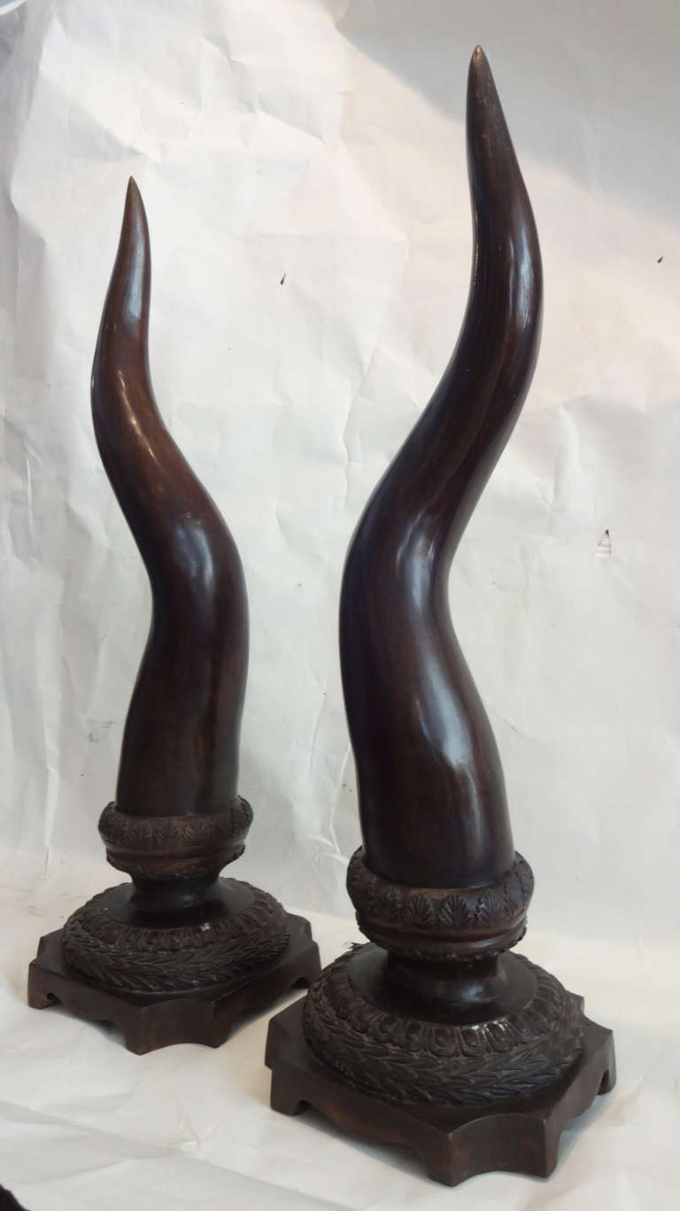 Pair of Bronze Tusks Statues on Stands In Excellent Condition In Sarasota, FL