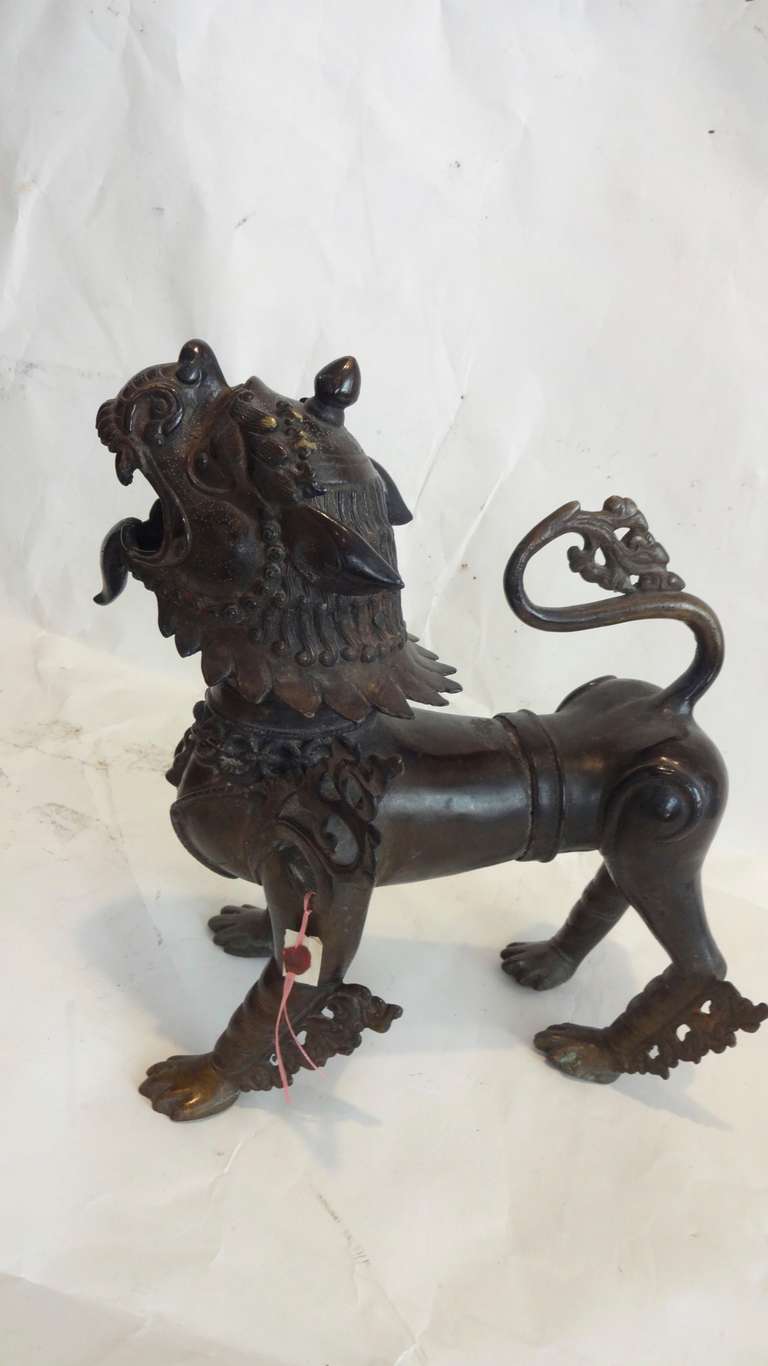 A bronze temple dog from Nepal
