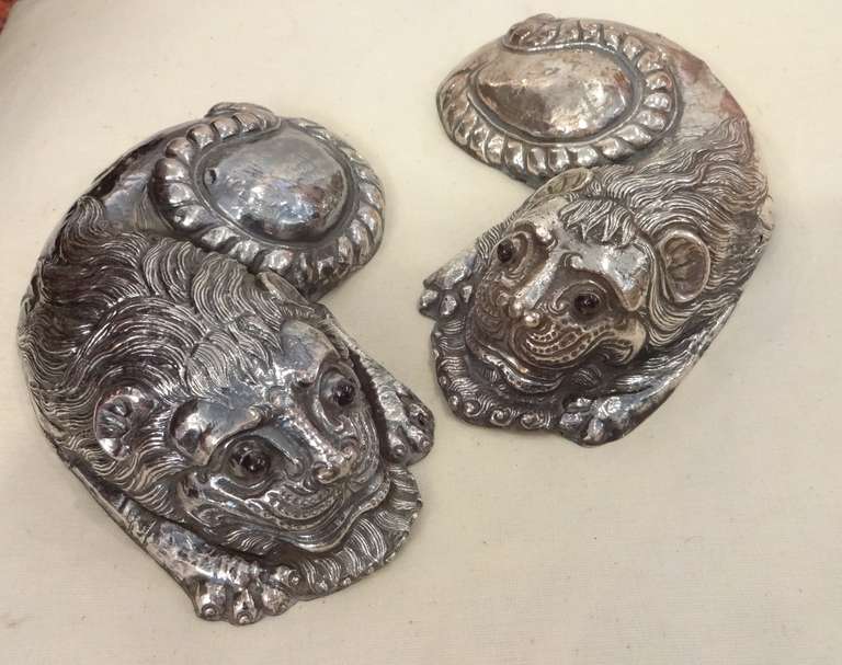 A pair of silver cats (High .925-.975) with cabochon semi-precious sapphire stone eyes from Bali, Lingarajin Province, North shore of Bali from the altar of (King) Anak (high class) Gusti Ngural Jelanti (Raja Mensala)