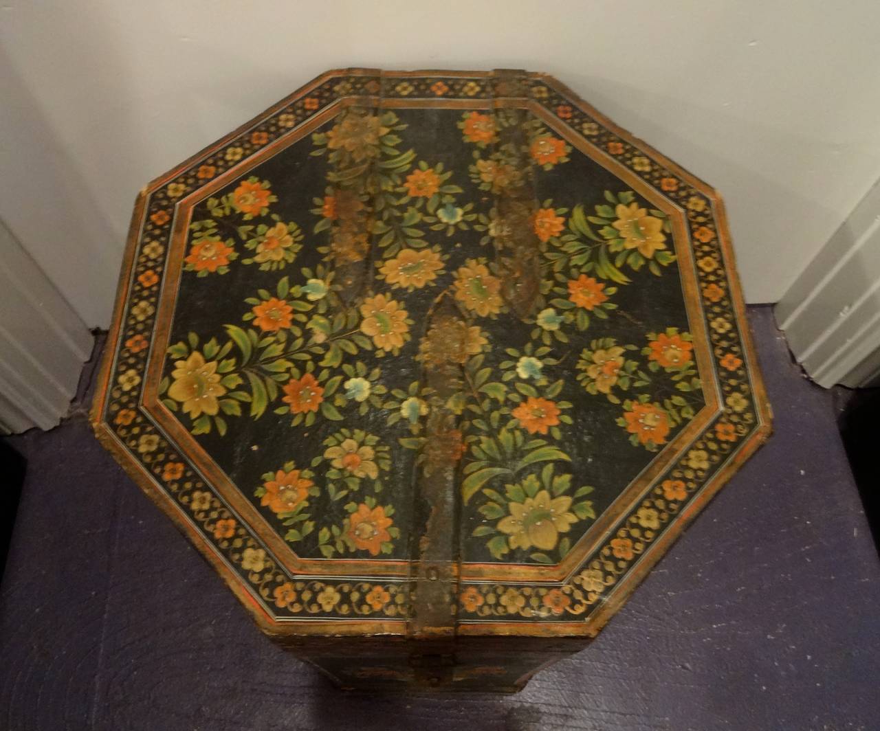 An English Chinese Export hexagonal hinged wedding box lacquered in black with floral motifs, brass handles.