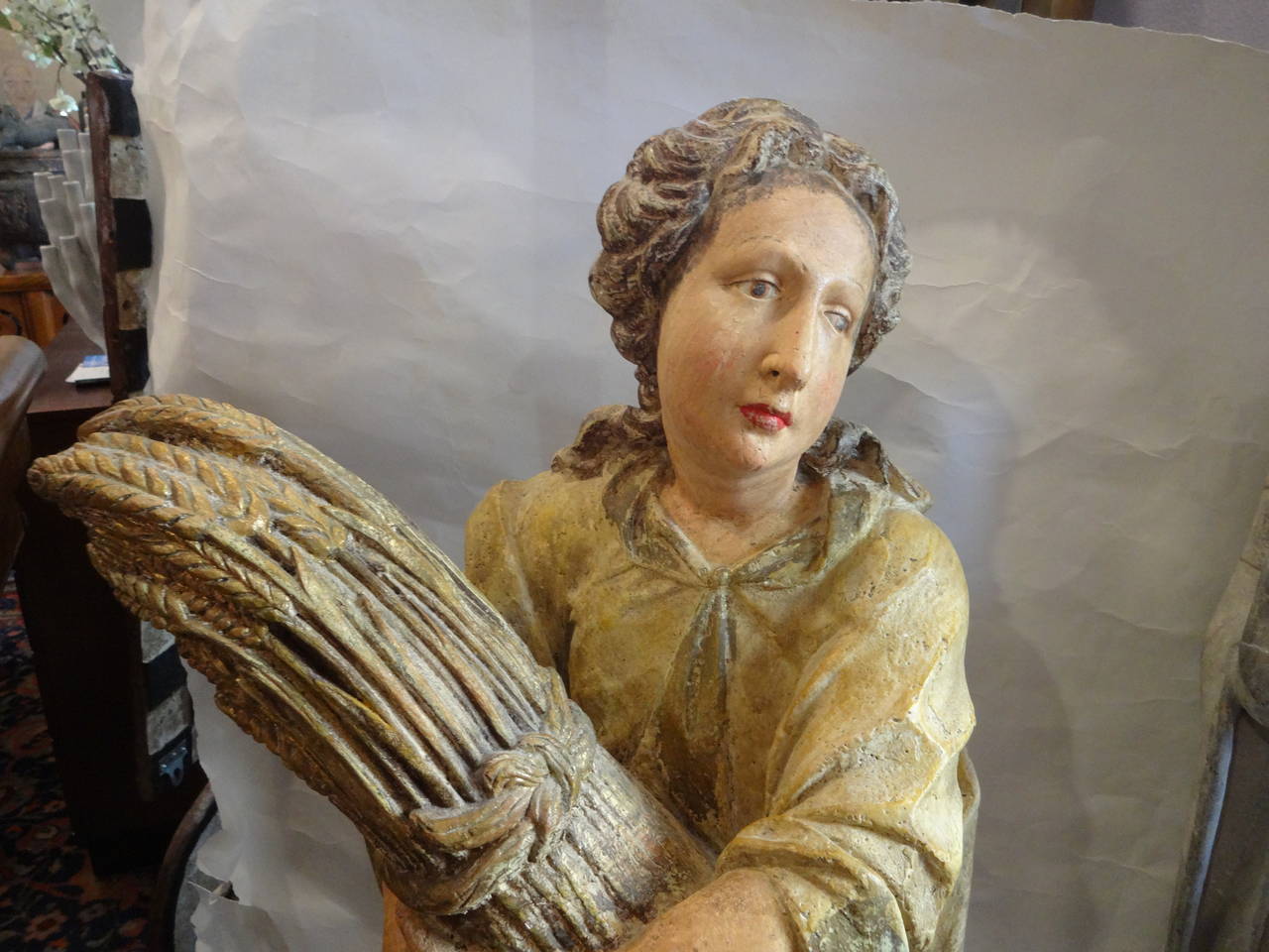 A resin and polychromed statue of 