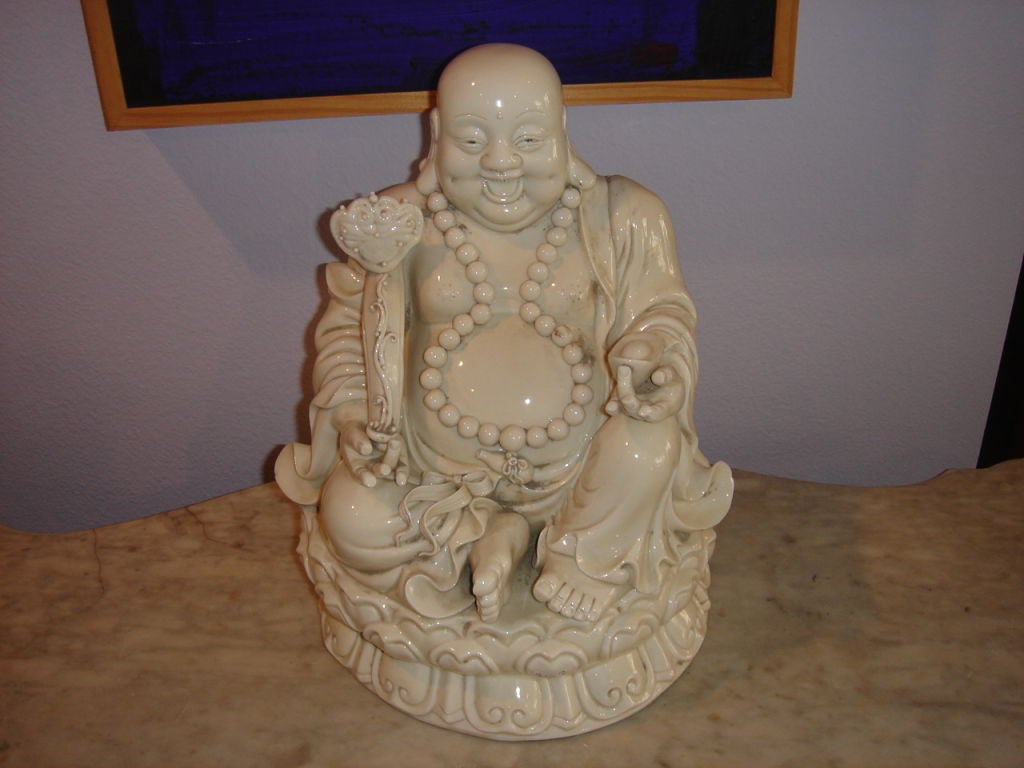 Statue of Hotei God of Happiness Buddha holding a ruya with pearls around his neck. wonderful smiling face, well done  marked He Chaozong