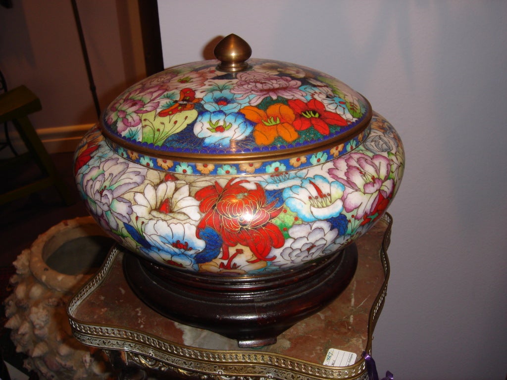 This extra large Cloisonné Center Piece Bowl with Lid and Stand is well done inside and out with flowers butterflies, etc. and finished with a a blue enamel finish brass with gold gilt trim. measurement is with stand