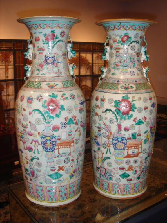 This pair of Chinese Tung Chin Palace Vases are exceptional. Hand made  and hand decoration which were made only during a 50 year period in this design. Showing the colors and items a scholer would have used.