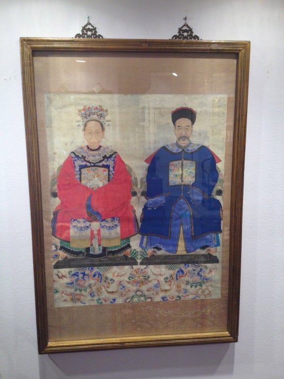 This well framed wit original hangers of Chinese Ancestors is feel done, hand painted high ranking court man (note the badges).  Beautiful colors of course hand painted on rice paper with silk background.