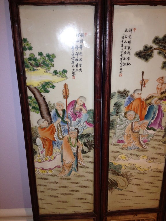 This Set of Four Wall Panel Screens are framed in mahogany and hand painted scenes of Lo-han Buddhas with white cinnabar panels set in the top ad bottom..well done   (Measurement is for each panel)