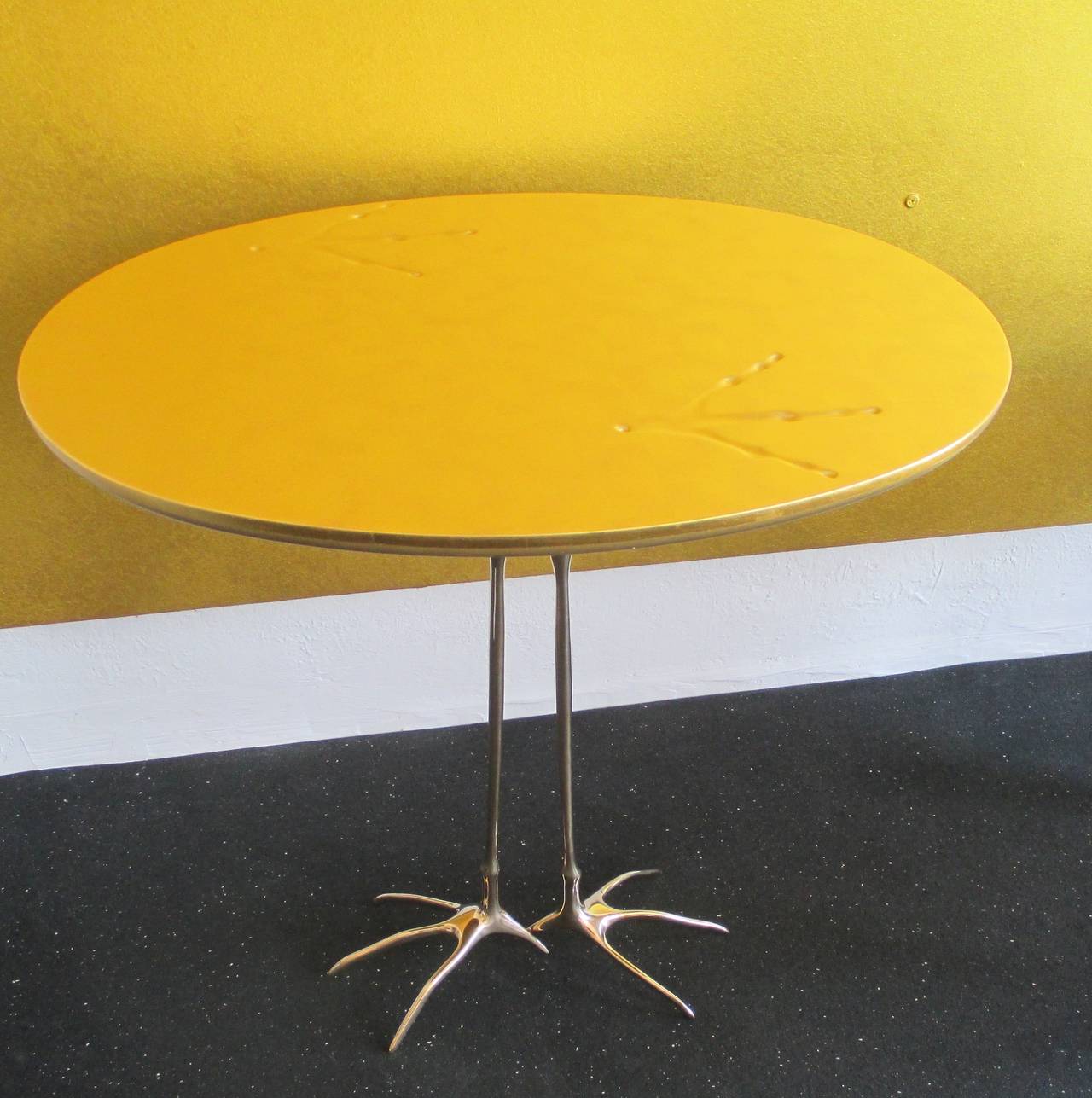 Small TABLE GOLD LEAFED W/BRASS LEGS by Meret Oppenheim.