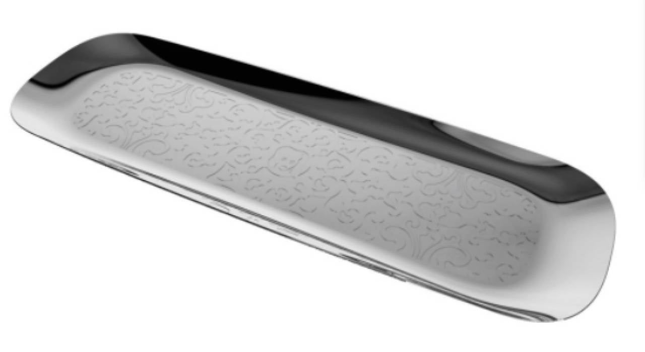 Dressed tray by Marcel Wanders stainless steel mirror
polished with relief.