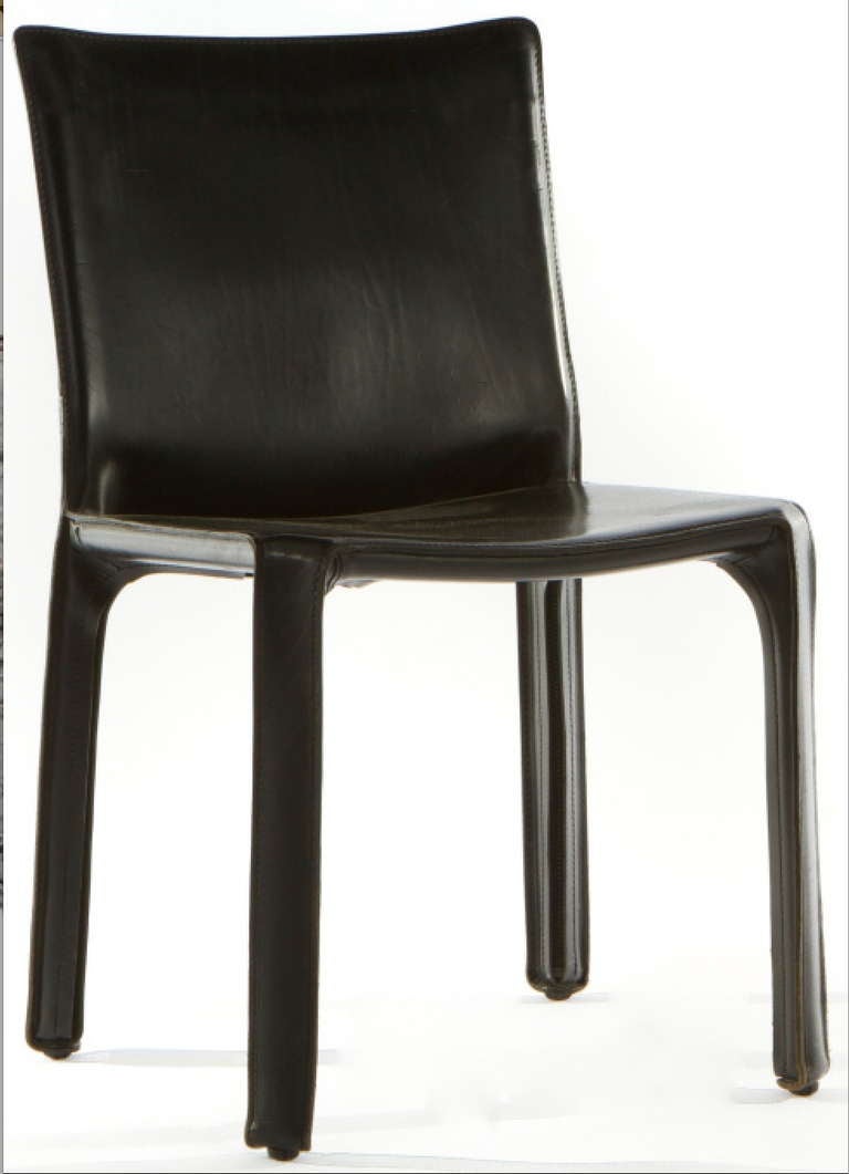 SIX BLACK LEATHER CHAIRS by MARIO BELLINI