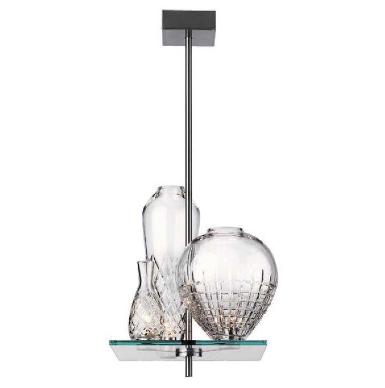 THREE BLOWN AND HAND-CUT LEADED CRYSSTAL VASES ACT AS THE SPARKLING SHADES, ATTACHED SECURELY to THE SQUARE GLASS PLATFORM lLIGHT SORCE 3 35W HALOGEN
