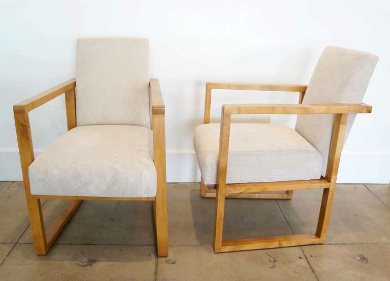 Pair of modernist french sycamore armchairs, upholstered in a bone courduroy. Tappered front to back. 23
