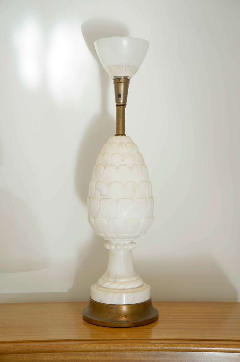 Beautifully hand worked artichoke form with exqusite beeding and rope details. Professionally re-wired with UL approved parts. The base and throat have been retouched. The fixure retains the orignal fitter ... edison base socket!

Stone body alone