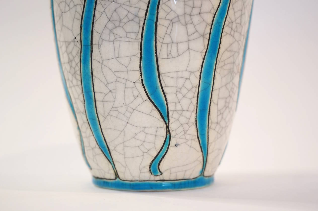 Charles Catteau vase for Boch Freres La Louviere. "Polychrome design with stylized gourd-like fruit, leaves, twigs and ribbons."