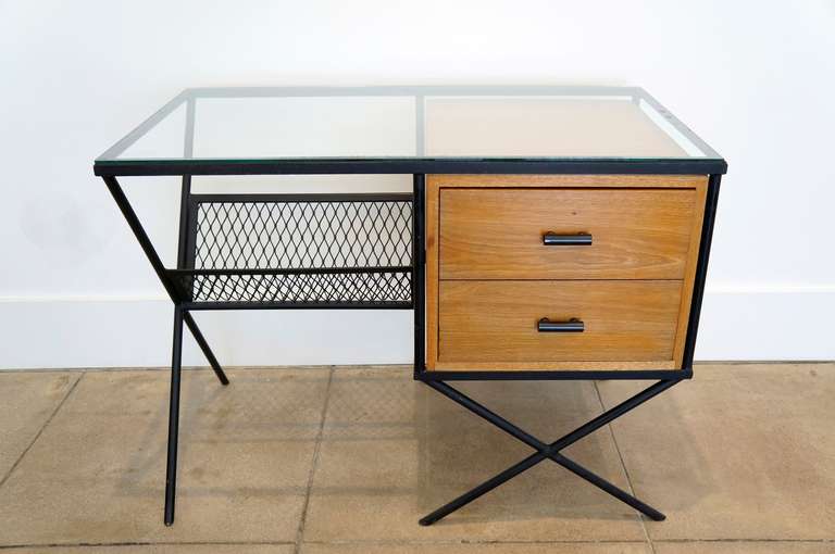 Compact desk by California designer Muriel Coleman, she among others were part of the California Modern Movement in the late 1940's and was part of the Pacifica Group. Interesting use of 