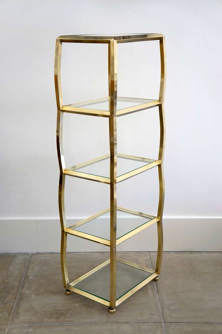 Italian Brass Etagere constructed of 3/4 heavy squared brass bowed, welded and biased. Five I/4