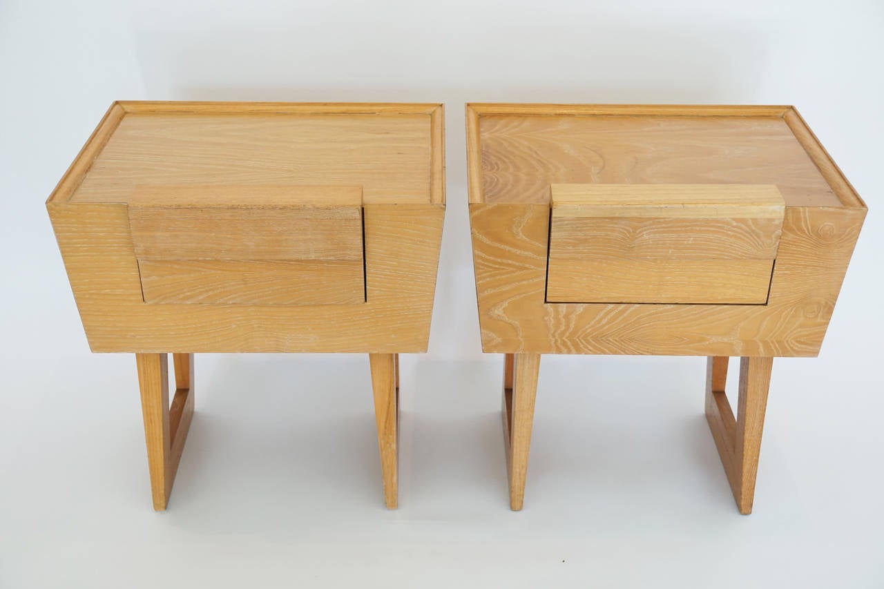 Bedside cabinets by Paul Laszlo for Brown Saltman of California. Beautiful flat grain oak with a modest angular design.