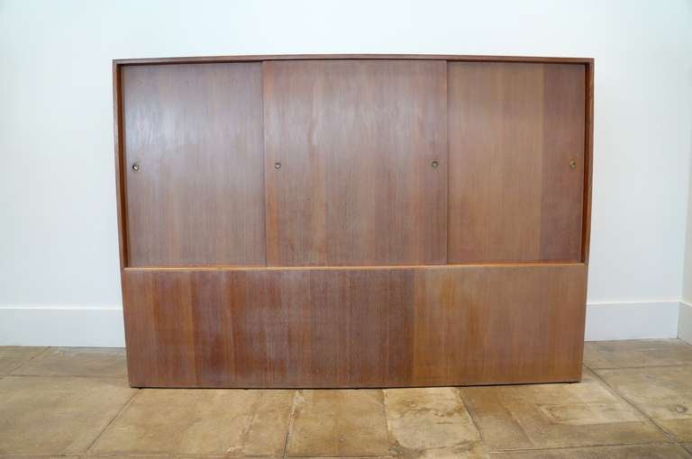 An extraordinary one of a kind custom room divider and storage unit. This was removed from a home in Arcadia California. Most likely built on site during the 1940's. The "VGF" vertical grain fir chosen for this piece is strong and true to