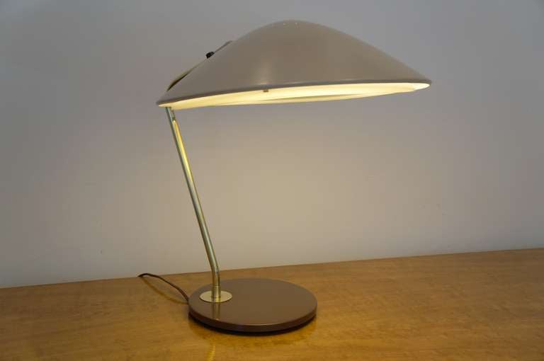 A Gerald Thurston chocolate base & beige hooded table lamp designed for Lightolier ... intact inset diffuser. The head articulates in several positions. It has been professionally re-wired with a silk twist cord. The brass upright has been stripped,