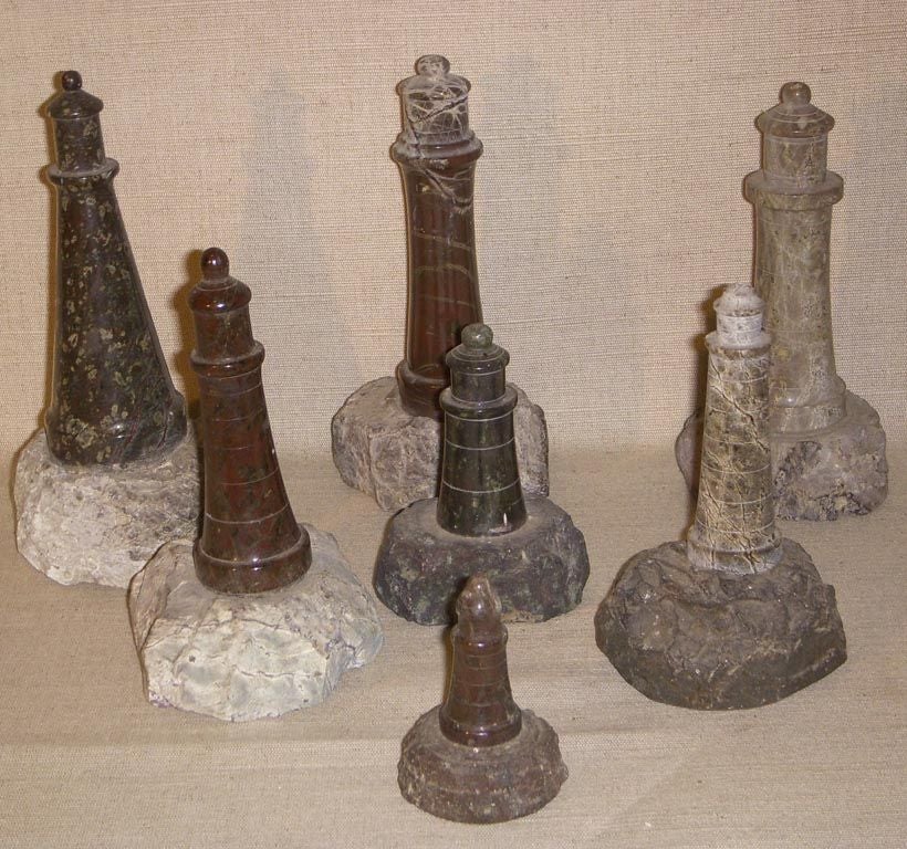 Collection of Seven Cornish Serpentine Hardstone Lighthouses, Mounted on 