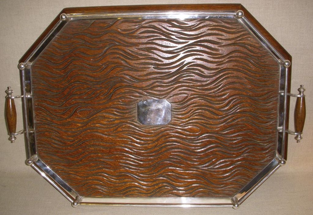 Distinctive Carved Oak and Silverplate Galleried Drinks Tray with Double Handles and Incised Wavy-Lined Design.  England, Late 19th Century.<br />
<br />
26 inches wide x 19 inches deep