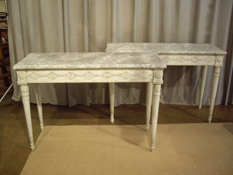 Pair of Louis XVI style painted Italian consoles.  Very good quality old wood with detailed painted faux marble finish. Can be sold separately.