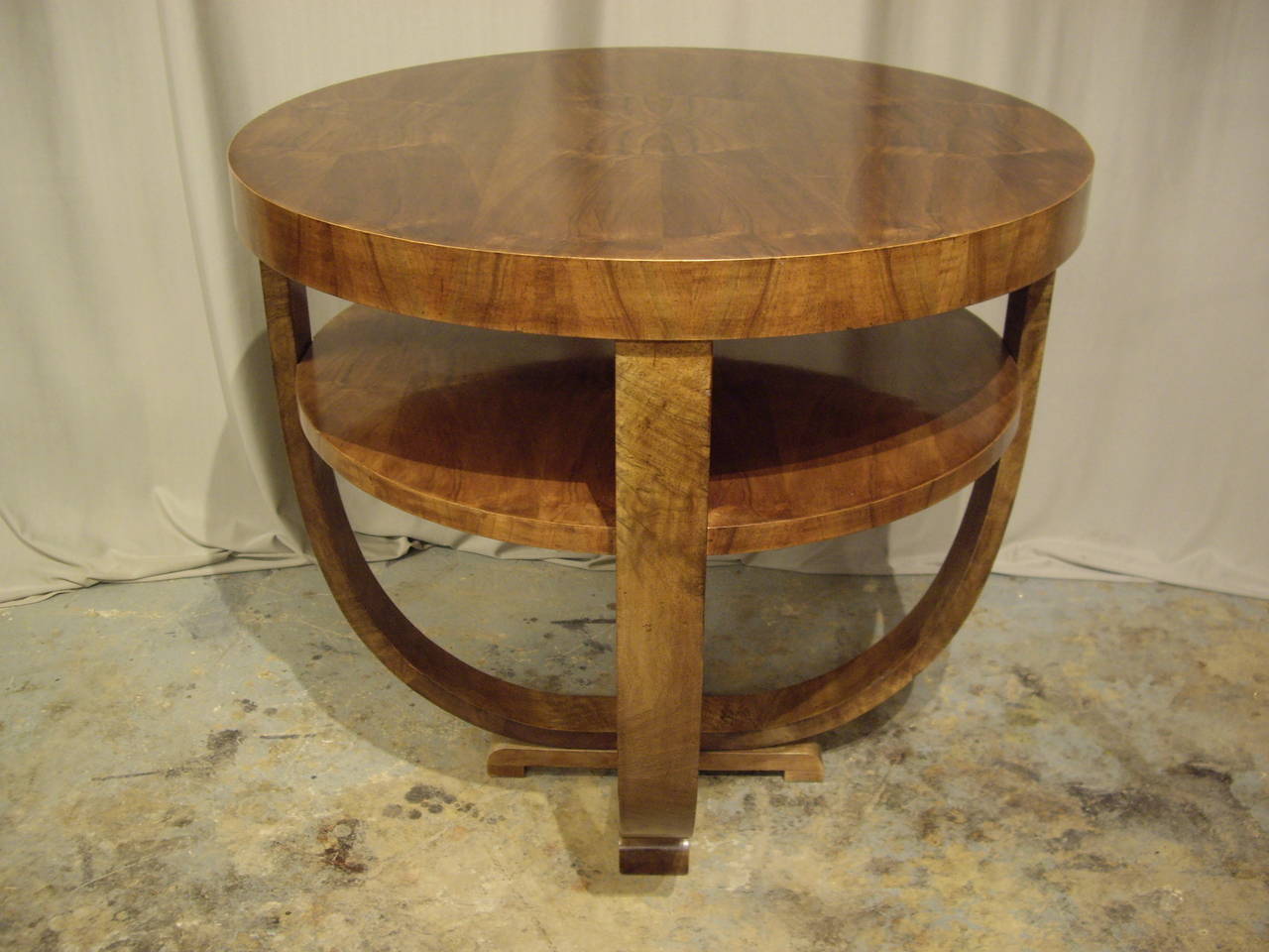 Very elegant Art Deco walnut table. Very nice patina with high shelf. Suitable for entrance hall table or side table.