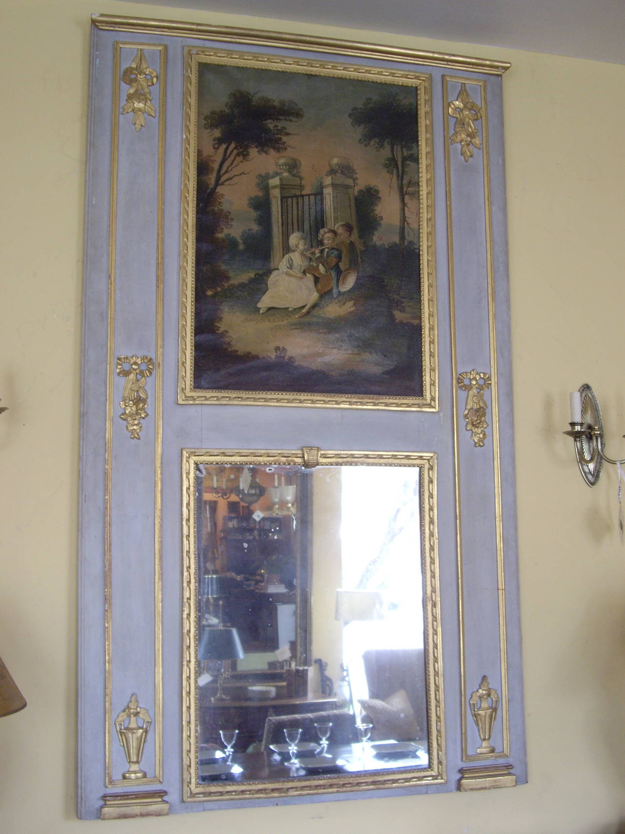 Painted French 19th century Trumeau mirror.  Lovely light blue with charming painting.