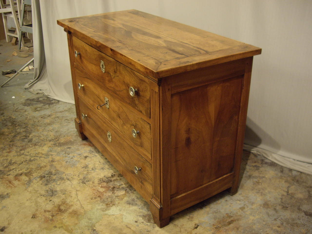 Carefully restored Directoire three-drawer commode. Very nice warm patina.