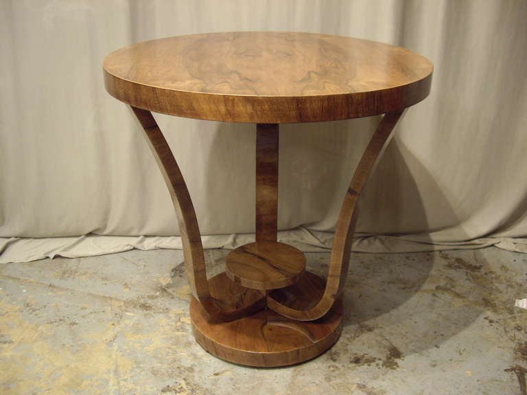 Very Elegant round walnut round Art Deco table.