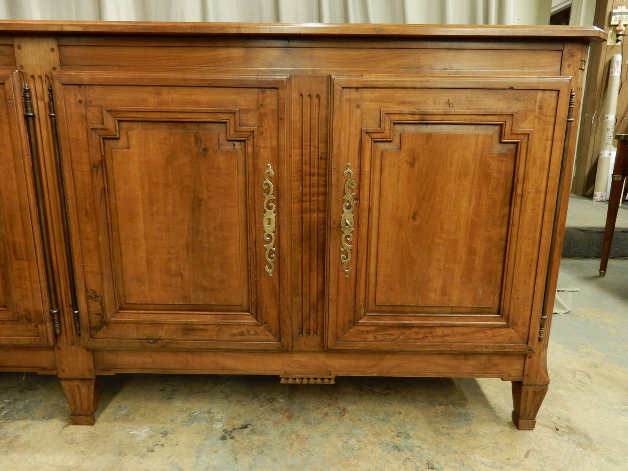 Beautifully restored French Directoire walnut four-door enfilade. Very nice warm patina.