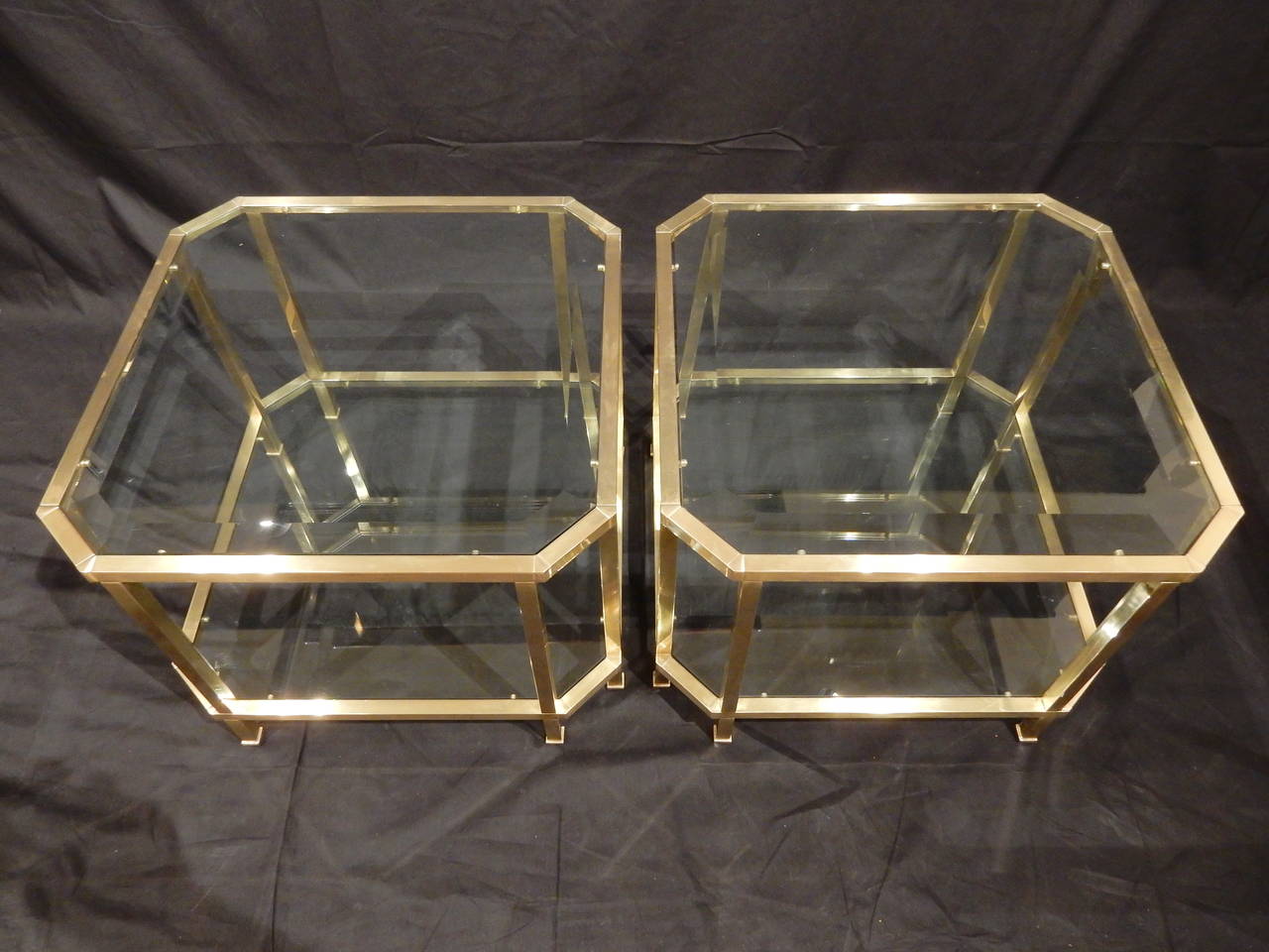 Beautiful high quality brass coffee table.  Made with careful attention to detail and quality workmanship.  Top glass beveled with plain glass on shelf.